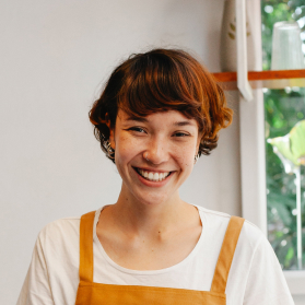 JENIFER LOUIS (Manager, "Gourmet Bites Cafe")